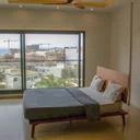 Lit Cotonou en Makoré (90cm) — vue latérale